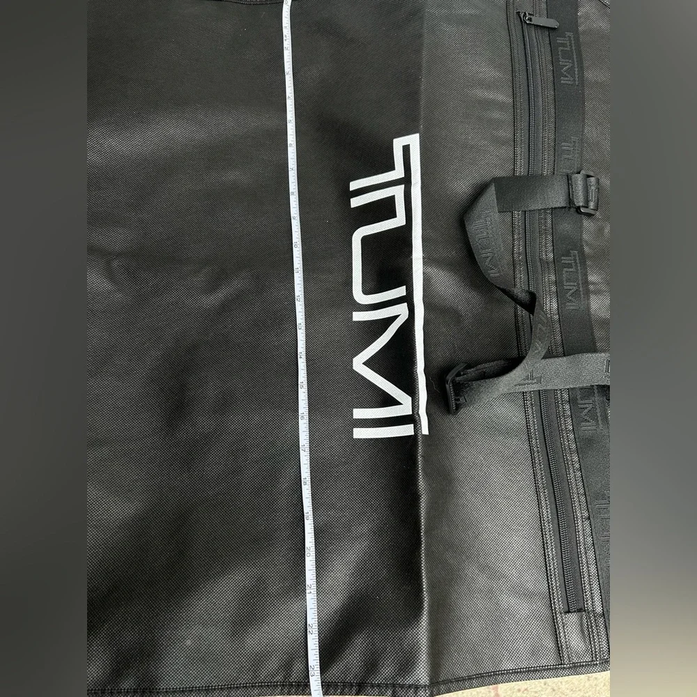Tumi Travel Garment Bag black suits and dresses, during travel NEW 52” long 23”